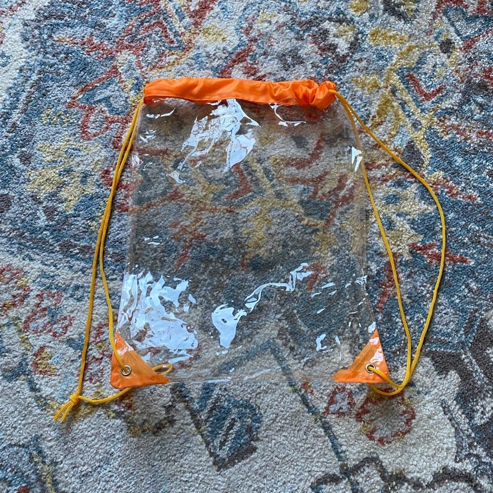 Clear Drawstring Backpack With Orange Accents - image 1